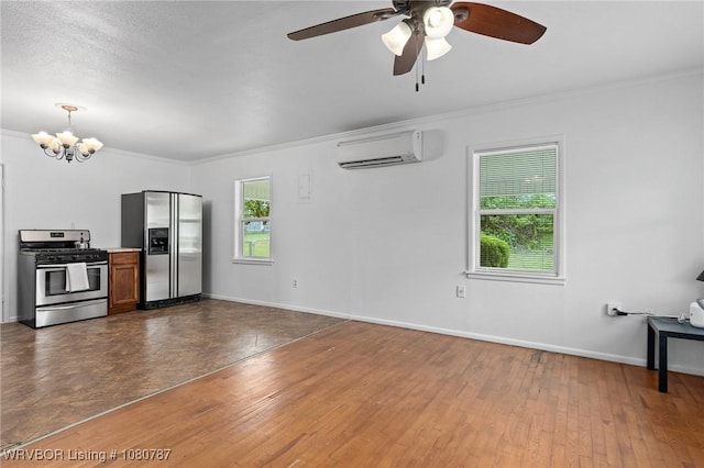 interior space with ceiling fan with notable chandelier, a wall unit AC, crown molding, dark wood-style flooring, and baseboards