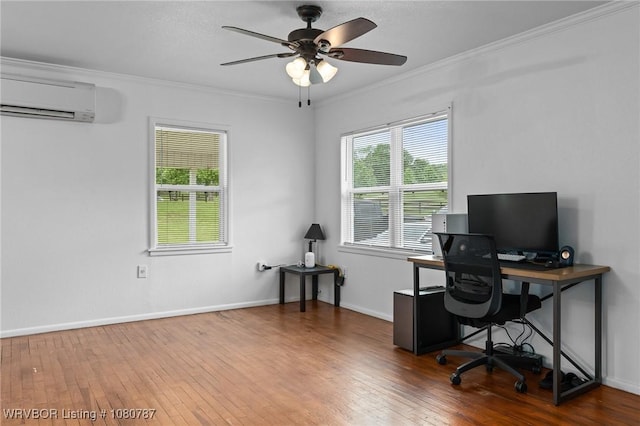 home office featuring a wall mounted air conditioner, wood-type flooring, a ceiling fan, and ornamental molding
