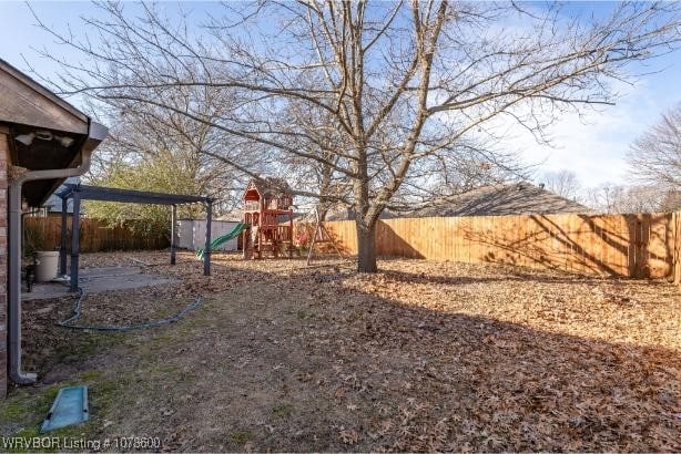 view of yard with a playground