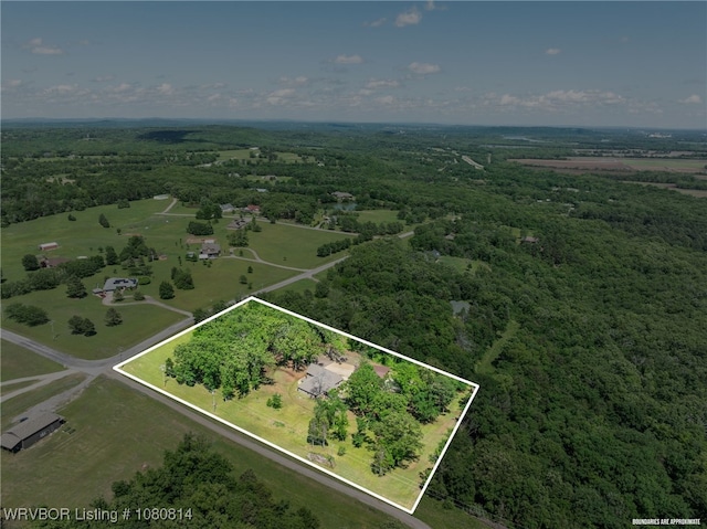 aerial view featuring a forest view