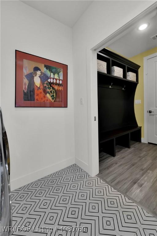 9100 Kirkwood Rd, Fort Smith, AR 72916 - mudroom featuring visible vents and baseboards