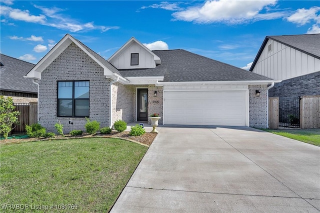 9100 Kirkwood Rd, Fort Smith, AR 72916 - view of front facade featuring an attached garage, brick siding, fence, and a front lawn