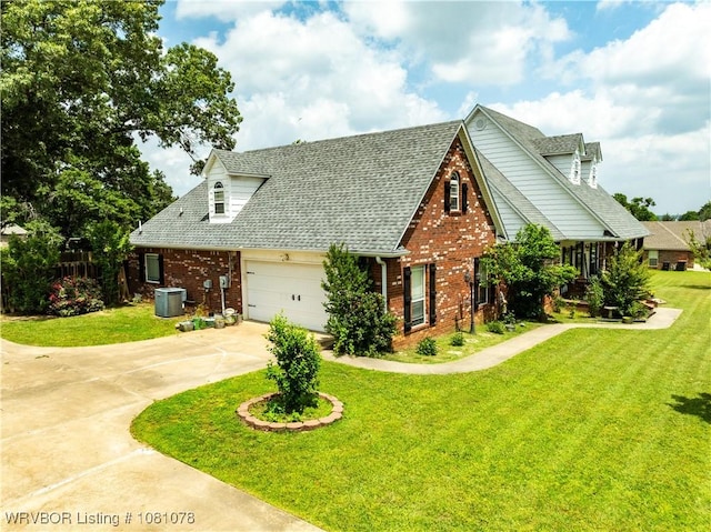 view of front facade featuring brick siding, concrete driveway, cooling unit, and an attached garage