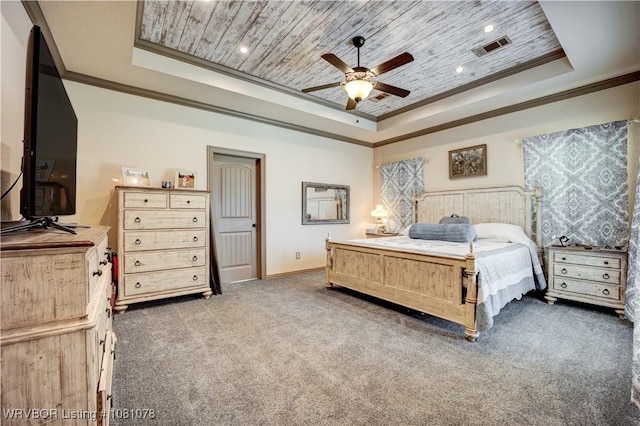 carpeted bedroom featuring a raised ceiling, crown molding, wooden ceiling, ceiling fan, and baseboards