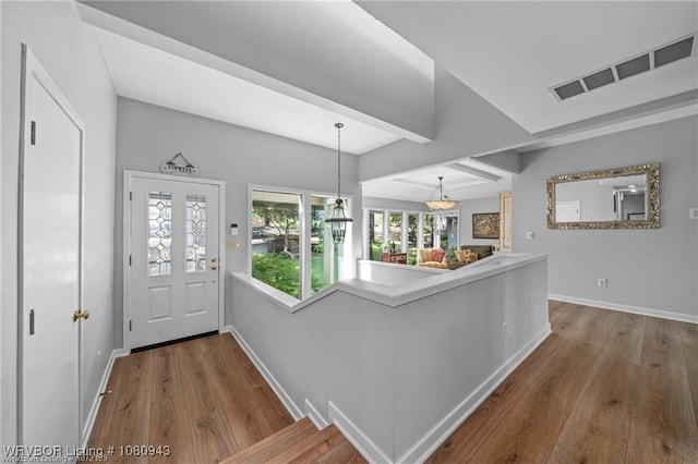 10301 Stoneleige St, Fort Smith, AR 72908 - entryway featuring wood finished floors, baseboards, and beamed ceiling