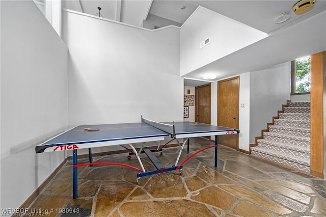 10301 Stoneleige St, Fort Smith, AR 72908 - rec room with stone floors and a towering ceiling