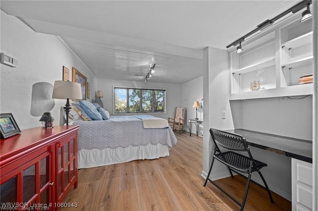10301 Stoneleige St, Fort Smith, AR 72908 - bedroom featuring rail lighting and wood finished floors