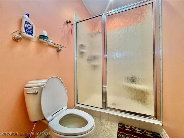4018 Blue Hole Rd, Rudy, AR 72952 - bathroom featuring a stall shower and tile patterned flooring