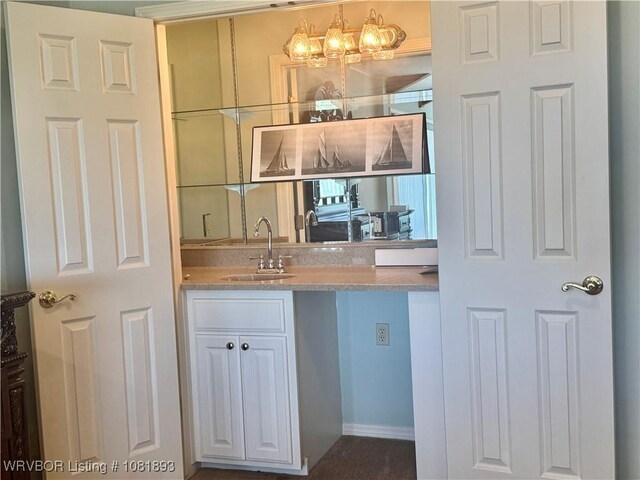 4018 Blue Hole Rd, Rudy, AR 72952 - indoor wet bar featuring a chandelier