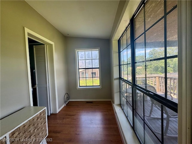 4018 Blue Hole Rd, Rudy, AR 72952 - unfurnished sunroom with lofted ceiling