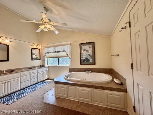 4018 Blue Hole Rd, Rudy, AR 72952 - full bathroom featuring vaulted ceiling, double vanity, a garden tub, ceiling fan, and tile patterned floors