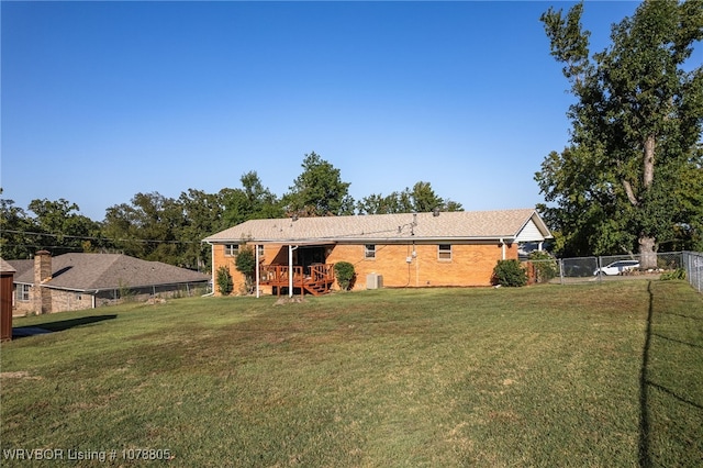 exterior space with a yard and a deck