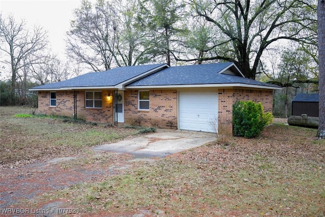 single story home with a garage