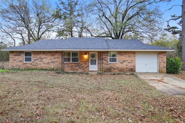 ranch-style home featuring a garage