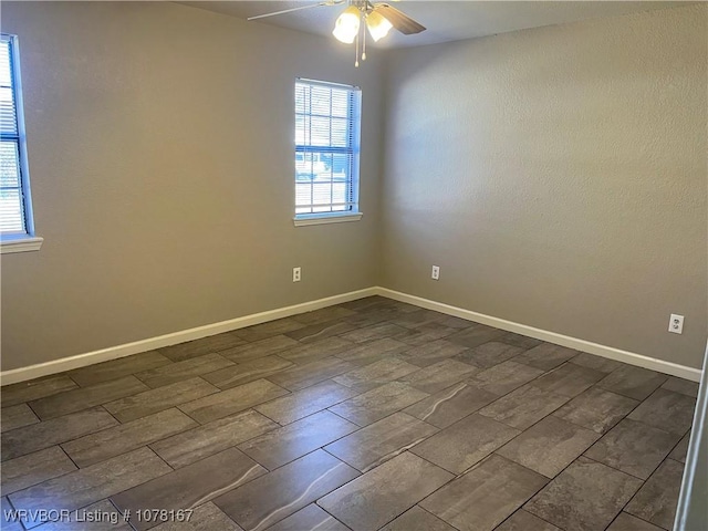 unfurnished room featuring ceiling fan