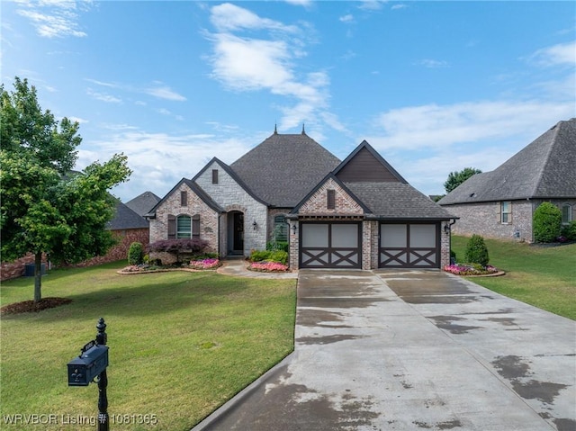 8404 Gatehouse Way, Fort Smith, AR 72916 - view of front facade featuring brick siding, driveway, a garage, a front lawn, and roof with shingles