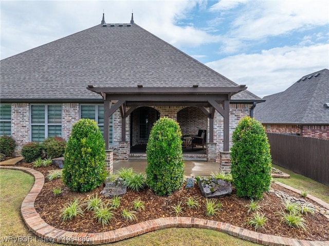 8404 Gatehouse Way, Fort Smith, AR 72916 - rear view of property featuring brick siding and roof with shingles