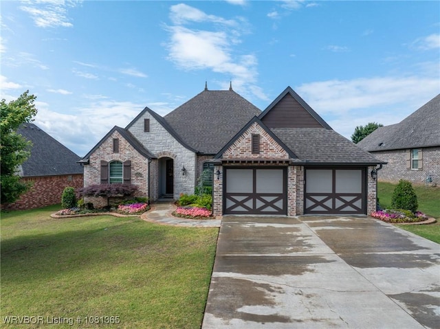 8404 Gatehouse Way, Fort Smith, AR 72916 - french country home with a front lawn, driveway, an attached garage, and brick siding