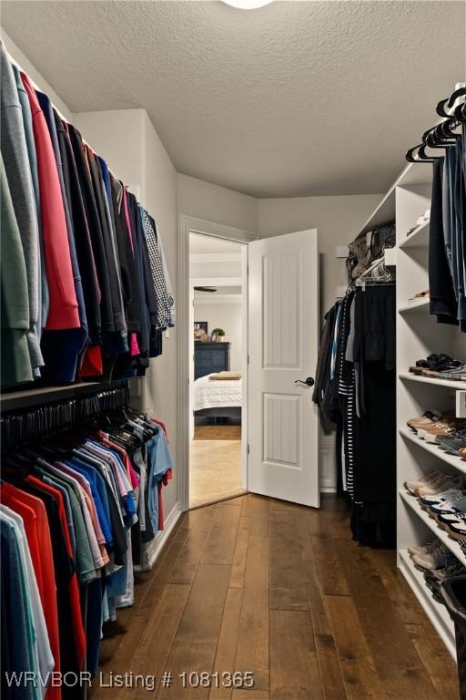 8404 Gatehouse Way, Fort Smith, AR 72916 - walk in closet with dark wood-style floors