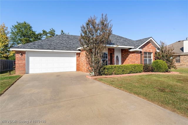 ranch-style house with brick siding, a shingled roof, concrete driveway, a front yard, and a garage