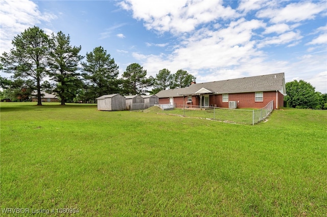 112707 S 4725th Rd, Muldrow, OK 74948 - view of yard featuring a shed and an outbuilding