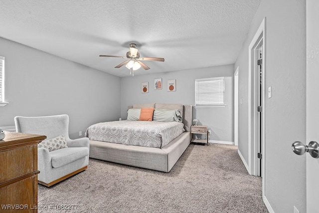 2509 Roxbury Ln, Fort Smith, AR 72908 - carpeted bedroom featuring a textured ceiling and a ceiling fan