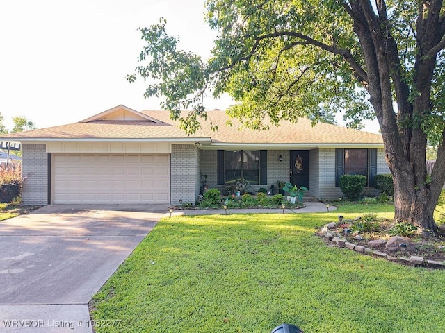 2509 Roxbury Ln, Fort Smith, AR 72908 - ranch-style home featuring concrete driveway, brick siding, a garage, and a front lawn
