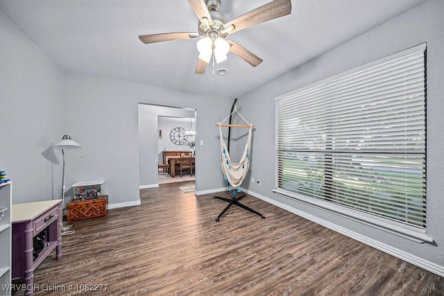 2509 Roxbury Ln, Fort Smith, AR 72908 - office area featuring wood finished floors, a ceiling fan, and a textured ceiling