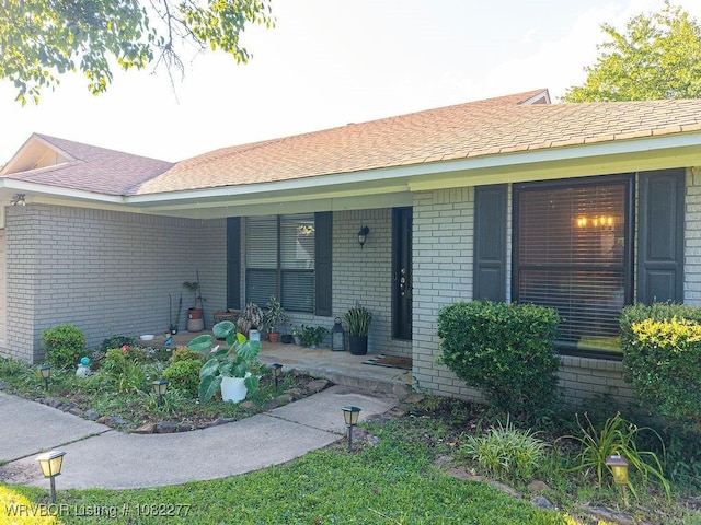 2509 Roxbury Ln, Fort Smith, AR 72908 - view of exterior entry with brick siding and covered porch