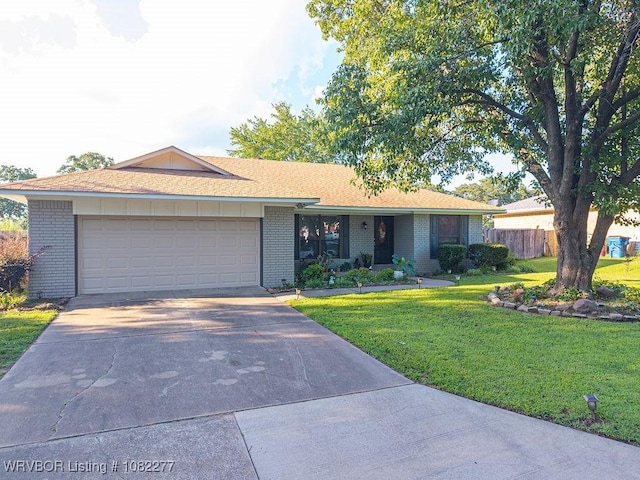 2509 Roxbury Ln, Fort Smith, AR 72908 - ranch-style home featuring brick siding, driveway, and a garage