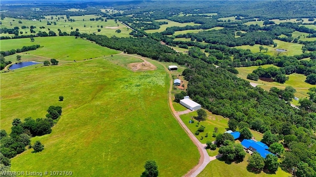 aerial view with a water view and a rural view