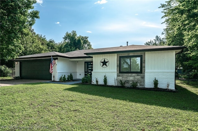 908 N 5th Ter, Barling, AR 72923 - view of front facade with an attached garage, concrete driveway, and stone siding