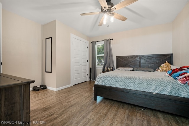 908 N 5th Ter, Barling, AR 72923 - bedroom featuring wood finished floors, baseboards, and a ceiling fan