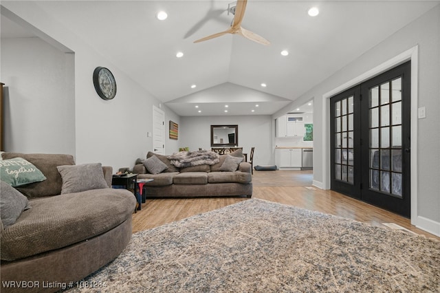 908 N 5th Ter, Barling, AR 72923 - living room with french doors, light wood-type flooring, a ceiling fan, lofted ceiling, and recessed lighting