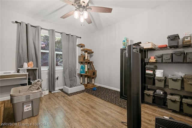908 N 5th Ter, Barling, AR 72923 - office space featuring wood finished floors, a ceiling fan, and baseboards