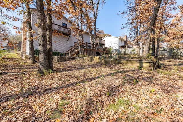 view of yard with a wooden deck