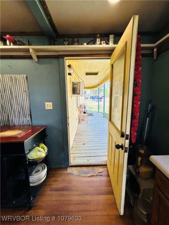 doorway with wood finished floors
