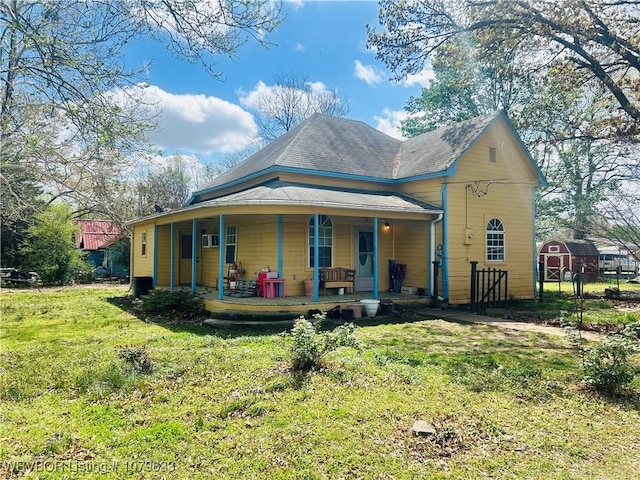 view of front of house featuring a front lawn and a porch