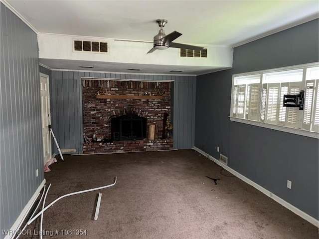 2006 Wolfe Ln, Fort Smith, AR 72901 - unfurnished living room with a ceiling fan, carpet flooring, a fireplace, baseboards, and crown molding