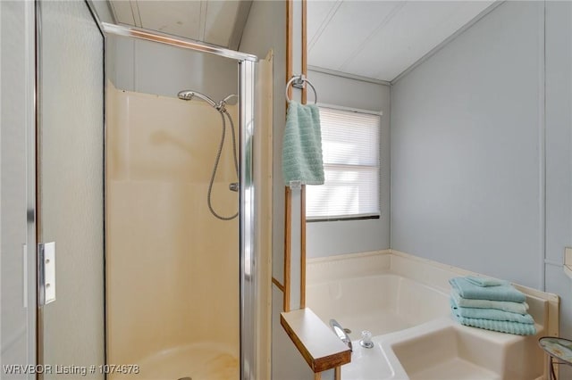 bathroom featuring plus walk in shower