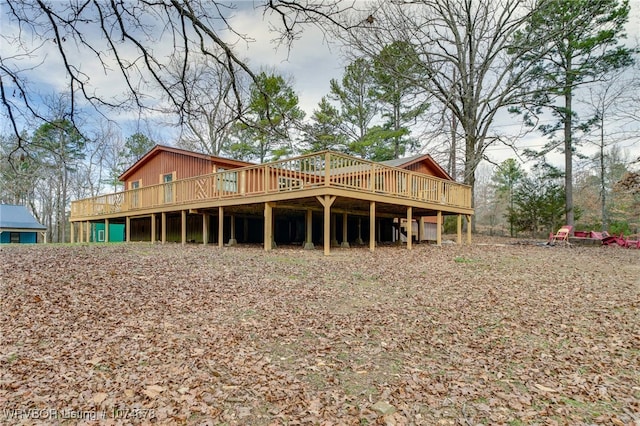 back of property with a deck