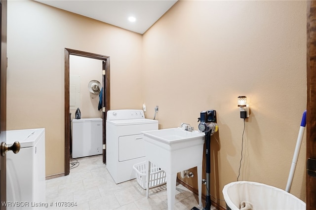 laundry area featuring washer and clothes dryer