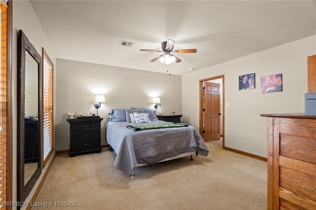1450 Ulmer St, Greenwood, AR 72936 - bedroom featuring baseboards, visible vents, light colored carpet, and ceiling fan