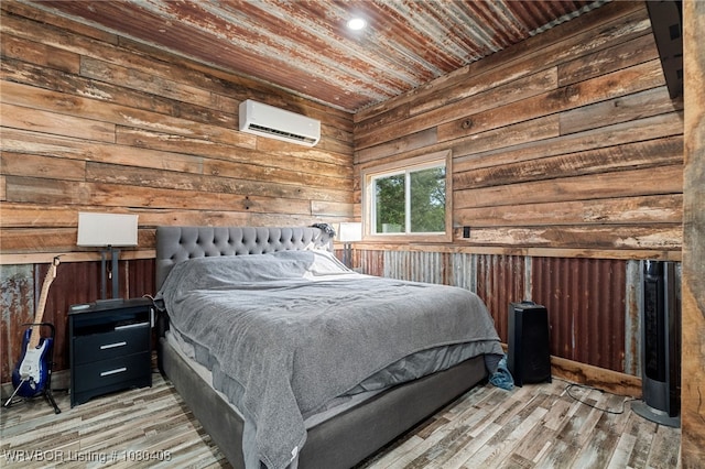 1450 Ulmer St, Greenwood, AR 72936 - bedroom featuring wood ceiling, an AC wall unit, wood walls, and wood finished floors