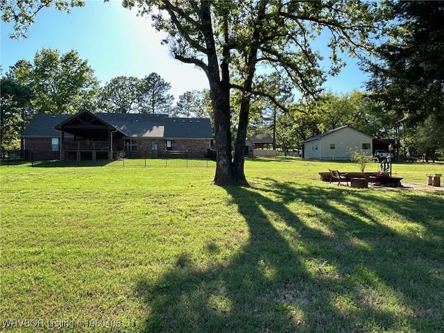 1450 Ulmer St, Greenwood, AR 72936 - view of yard with a fire pit and a patio