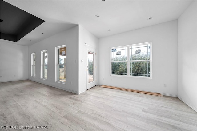 empty room featuring light hardwood / wood-style floors