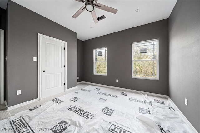 spare room featuring ceiling fan