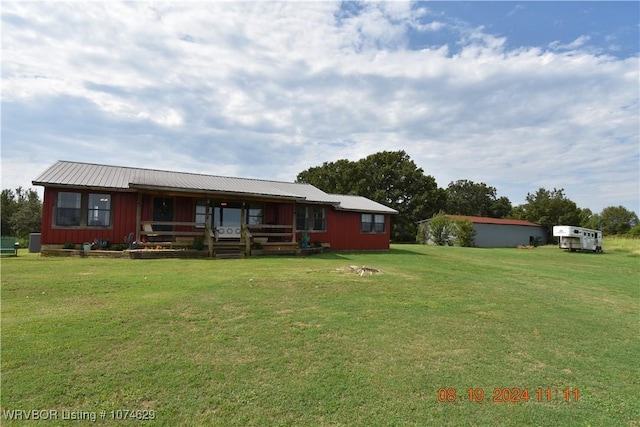 view of front of house featuring a front lawn and a porch