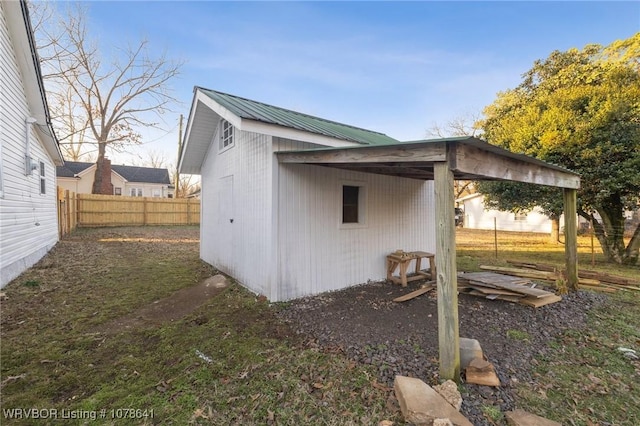 411 N Logan St, Charleston, AR 72933 - view of side of home with an outdoor structure