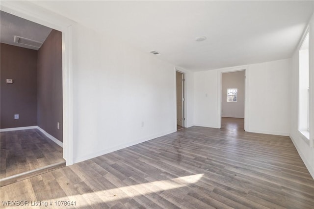 411 N Logan St, Charleston, AR 72933 - unfurnished room featuring hardwood / wood-style flooring